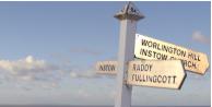 road sign on worlington hill